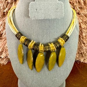 Bakelite, Necklace Dark Green Arching Dangles with beige needs and bronce